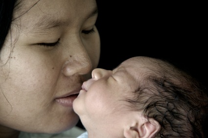 mother with just born baby
